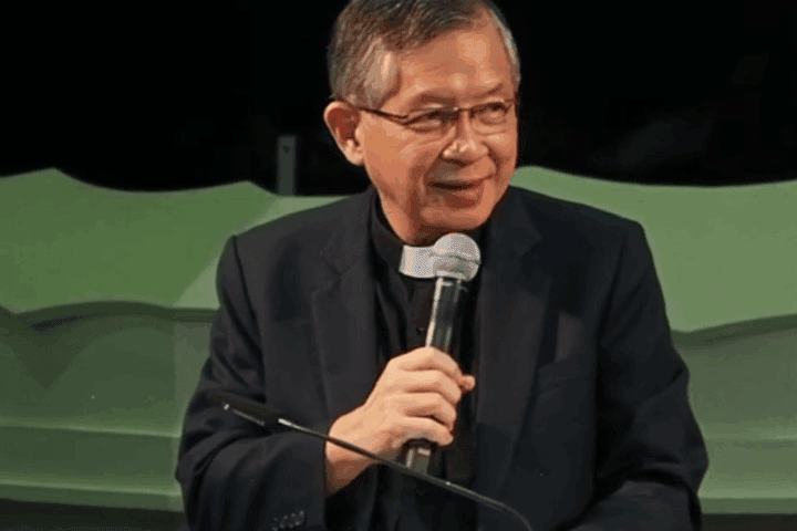 Elderly pastor speaking at Fairfield Methodist Church, serving the Singapore community.