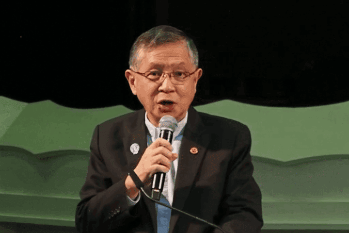 Community leader speaking at Fairfield Methodist Church during a church event.
