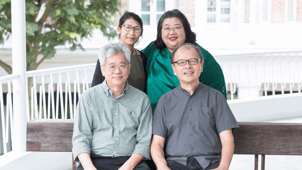 Fairfield leaders at Fairfield Methodist Church Singapore in a welcoming outdoor setting.